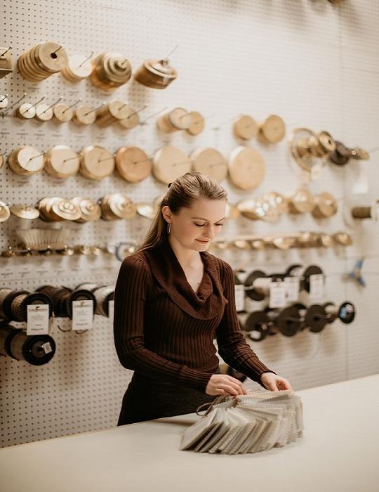 Melissa Perry looking at fabric samples